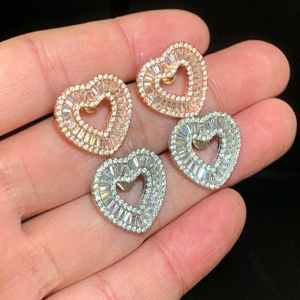 Hollow Hearts” studded earrings